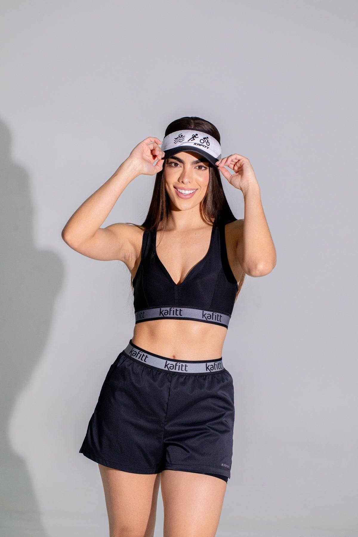 PANTALONETA DE RUNNING CON LICRA NEGRA MUJER